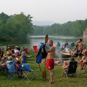 Group camping on the river