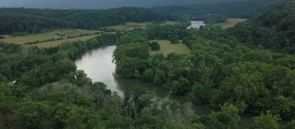 aerial view of lots of trees surrounding the winding river Downriver Canoe Company Shenandoah Valley River