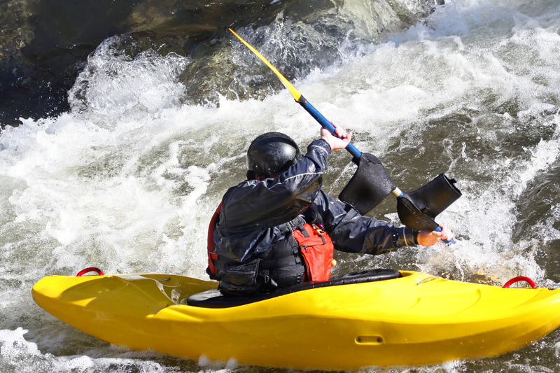 man in a whitewater kayak