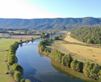 a scenic look at the calm river Downriver Canoe Company Shenandoah Valley River